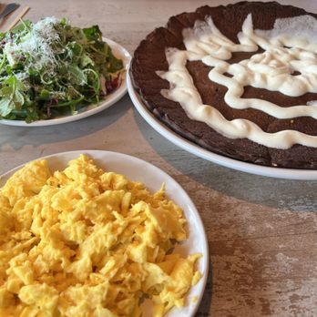 Toast Kitchen & Bar - Chocolate Velvet Pancake Combo with a side of scrambled just eggs and arugula salad. - Breakfast & Brunch Near Me - Brea, California Toast Kitchen & Bar - Chocolate Velvet Pancake Combo with a side of scrambled just eggs and arugula salad. - Breakfast & Brunch Near Me - Brea, California