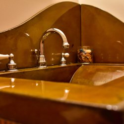 Ornamental Concrete - Precast acid stained concrete sink.