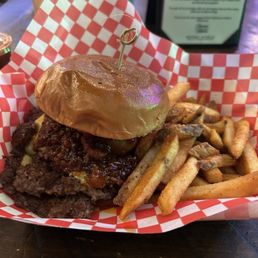 western burger with fries is really good! smash burger style with bacon jam, onion rings, and bbq sauce! western burger with fries is really good! smash burger style with bacon jam, onion rings, and bbq sauce!