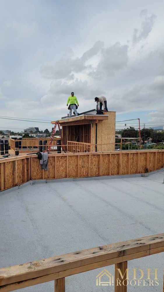 Slide of MDH Roofers