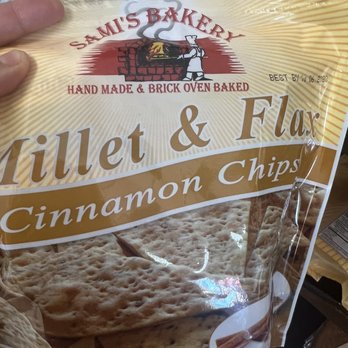 Sami's Bakery - a hand holding a bag of millet and flax cinnamon chips - Bakeries Near Me - Tampa, Florida