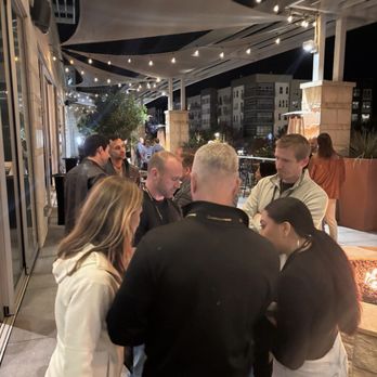 Archer Hotel Austin - Welcome happy hour on terrace with fire pits - Hotels Near Me - Austin, Texas Archer Hotel Austin - Welcome happy hour on terrace with fire pits - Hotels Near Me - Austin, Texas