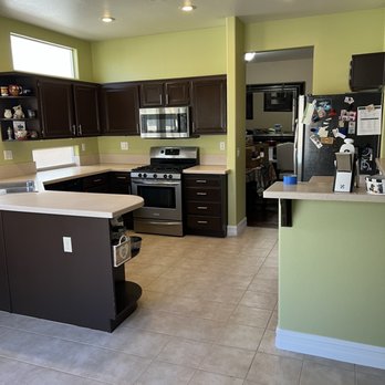 Gomez Pro Paint - Kitchen, walls, baseboards, and cabinets redone with handles installed - Painters Near Me