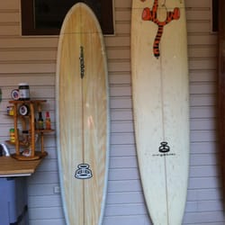 Mystic Surfboards - 8' fish with custom art and the Tigger 9'2" log