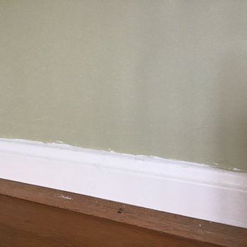 Color Flooring Kitchen and Bath - Sloppy trim work. - Carpeting Near Me - Alexandria, Virginia