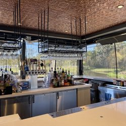 Page's Okra Grill - Open air bar with pond view