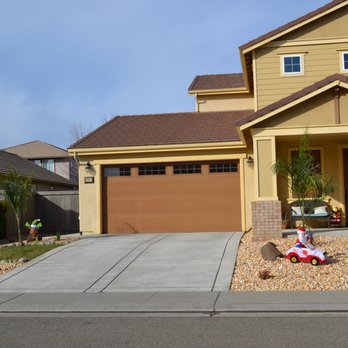 Landpark Landscape - a house with a flag on the front yard - Landscaping Near Me - Elk Grove, California Landpark Landscape - a house with a flag on the front yard - Landscaping Near Me - Elk Grove, California