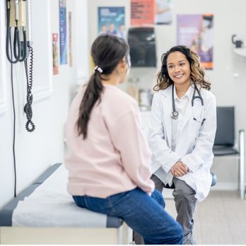 FPA Women's Health - Berkeley - A doctor sits with a patient in a clean, welcoming exam room, creating a warm and supportive atmosphere focused on personalized car - Obstetricians & Gynecologists Near Me - Berkeley, California FPA Women's Health - Berkeley - A doctor sits with a patient in a clean, welcoming exam room, creating a warm and supportive atmosphere focused on personalized car - Obstetricians & Gynecologists Near Me - Berkeley, California