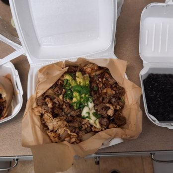 Arepitas - Mixed meat plate with cabbage salad. Side of beans (right) and Party Animal arepa with cabbage - Venezuelan Near Me - Round Rock, Texas