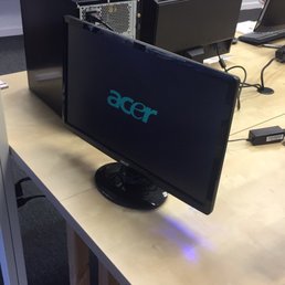 Desktop computer and monitor inside the store