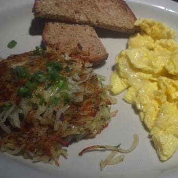 JaK's Grill - Simple 3-egg scramble with swiss and my favorite potato pancakes subbed in - American Near Me - Seattle, Washington