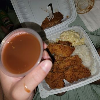 L&P Drive Inn - a person holding a cup of coffee and a plate of food - Fast Food Near Me - Waianae, Hawaii L&P Drive Inn - a person holding a cup of coffee and a plate of food - Fast Food Near Me - Waianae, Hawaii
