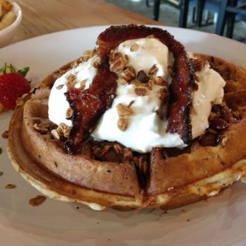 The People’s Kitchen - The best waffle on the planet! Otherwise known as the crispy waffle with candied bacon, granola, strawberry jam, pearl sugar, whipped cream! - American Near Me - Lansing, Michigan