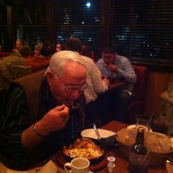 Johnny Carino's - Dad...chowin' down on a Skilletini dinner.
