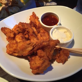 Yard House - Boneless wings with sauce on the side. - New American Near Me - Honolulu, Hawaii Yard House - Boneless wings with sauce on the side. - New American Near Me - Honolulu, Hawaii