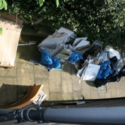 Elegant Interiors - Debris left on premises after he abandoned the job