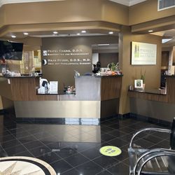 Peninsula Orthodontic Group - Dentist office shares an office w/oral surgery office.