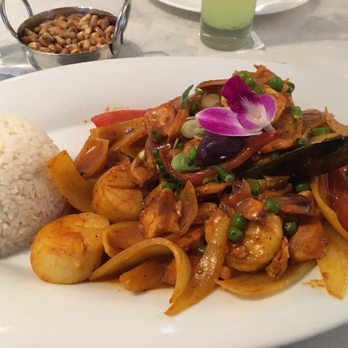 CVI.CHE 105 - Corvina with seafood and a spicy sauce... Can't remember the name of it. - Peruvian Near Me - Miami, Florida CVI.CHE 105 - Corvina with seafood and a spicy sauce... Can't remember the name of it. - Peruvian Near Me - Miami, Florida