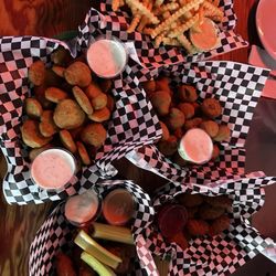 Crinkle fries, fried pickles, jalapeño poppers, chicken wings
