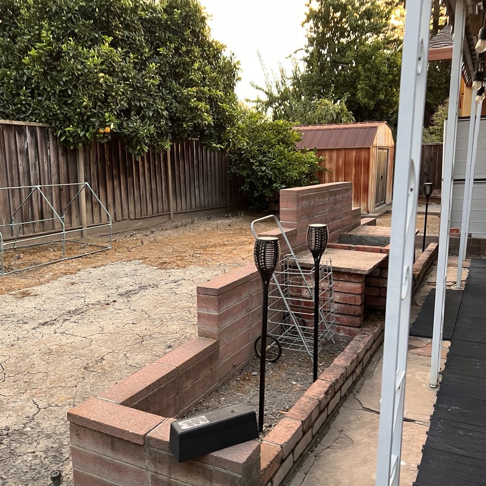 Action Landscaping - a back yard with a fire pit - Landscaping Near Me - San Jose, California Action Landscaping - a back yard with a fire pit - Landscaping Near Me - San Jose, California