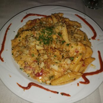 Louisianne's - Daily special with grilled shrimp, crawfish tails, and andouille sausage cream sauce, topped with shaved parmesan. Yum! - Cajun/Creole Near Me - Middleton, Wisconsin