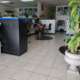 Pic of Tattoo lady cleaning up her work station. Pic of Tattoo lady cleaning up her work station.