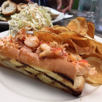 Off The Hook Raw Bar & Grill - Lobster roll with coleslaw and chips. - Seafood Near Me - Astoria, New York Off The Hook Raw Bar & Grill - Lobster roll with coleslaw and chips. - Seafood Near Me - Astoria, New York