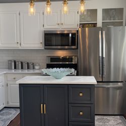 Affordable Granite & Cabinetry - finished kitchen with countertops