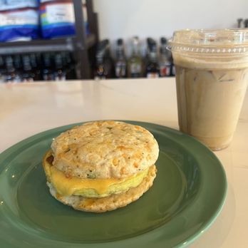 Pine Scone Cafe - Southern Pines - South Carolina breakfast sandwich. Shaken espresso with cherry. - Coffee & Tea Near Me - Southern Pines, North Carolina Pine Scone Cafe - Southern Pines - South Carolina breakfast sandwich. Shaken espresso with cherry. - Coffee & Tea Near Me - Southern Pines, North Carolina