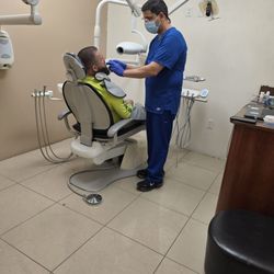Sergio A Vega, DMD - My husband getting a root canal done. Amazing doctor