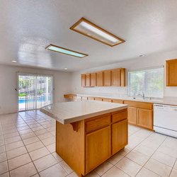 Pacific Property Management & Sales - Large Kitchen with island perfect for entertaining!