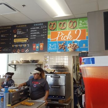 Auntie Anne's - a woman preparing food in a restaurant - Pretzels Near Me - Oak Brook, Illinois Auntie Anne's - a woman preparing food in a restaurant - Pretzels Near Me - Oak Brook, Illinois