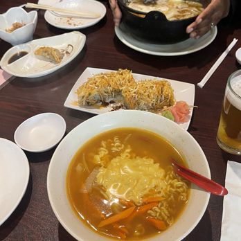 Edo Japanese Restaurant - Cheesy ramen Sukiyaki Gyoza on the left and a sushi roll between the soups! Everything was good. - Japanese Near Me - Crest Hill, Illinois Edo Japanese Restaurant - Cheesy ramen Sukiyaki Gyoza on the left and a sushi roll between the soups! Everything was good. - Japanese Near Me - Crest Hill, Illinois