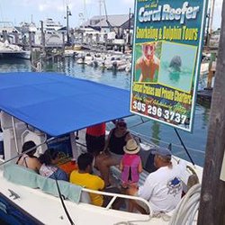 Clothing Optional Charters - Look for our sign when you arrive at the dock, we'll be ready for you!
