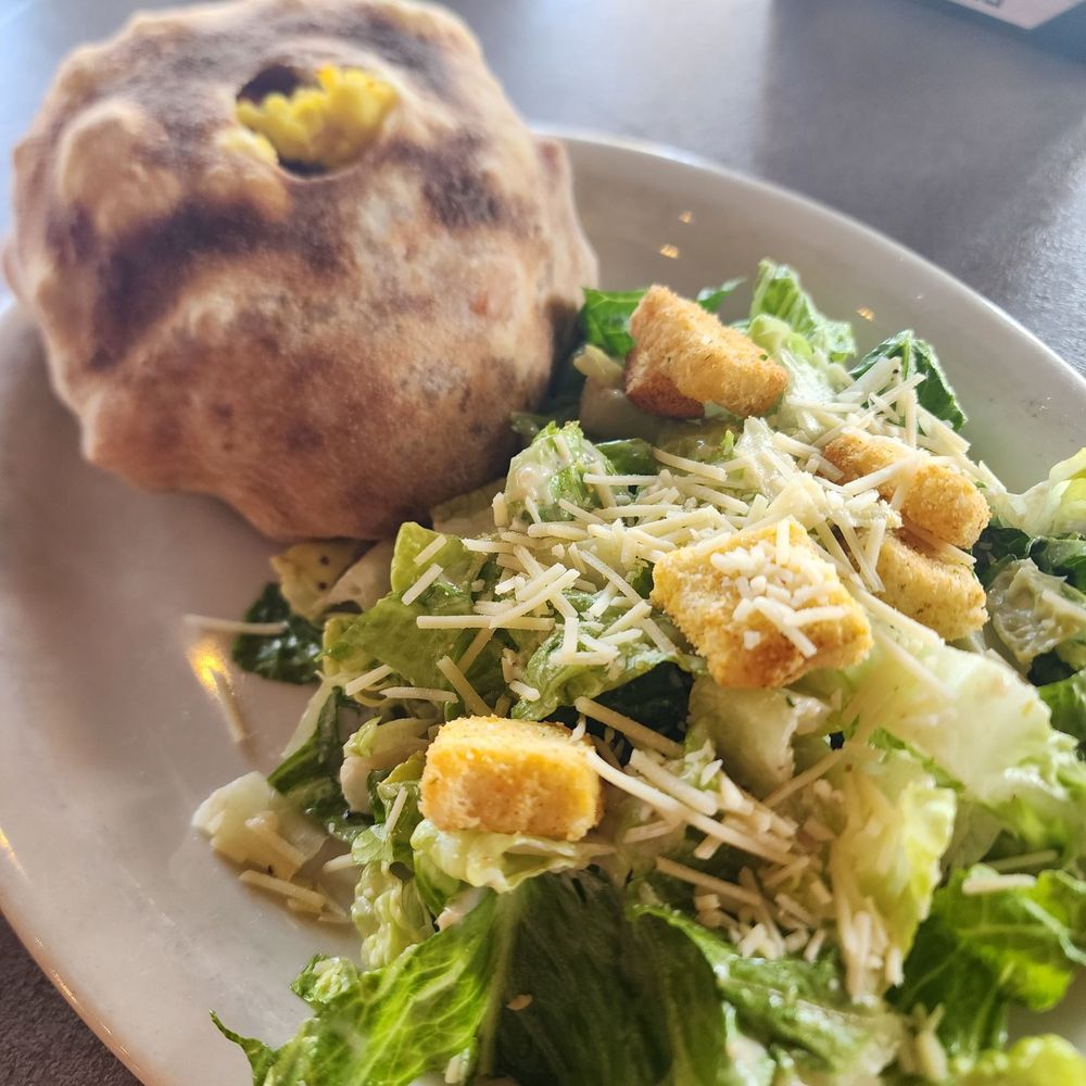 Brunch burger and Caesar salad Brunch burger and Caesar salad