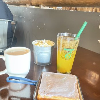 Grotto Tea Lounge - Left: almond malt milk tea Front: taro butter toast - Coffee & Tea Near Me - Mississauga, Ontario Grotto Tea Lounge - Left: almond malt milk tea Front: taro butter toast - Coffee & Tea Near Me - Mississauga, Ontario