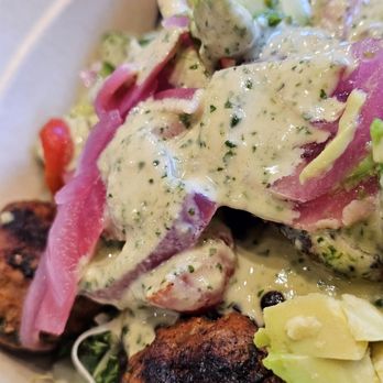 CAVA - Close-up of the Lamb & Avocado Chef-Curated bowl. - Mediterranean Near Me - Roanoke, Virginia