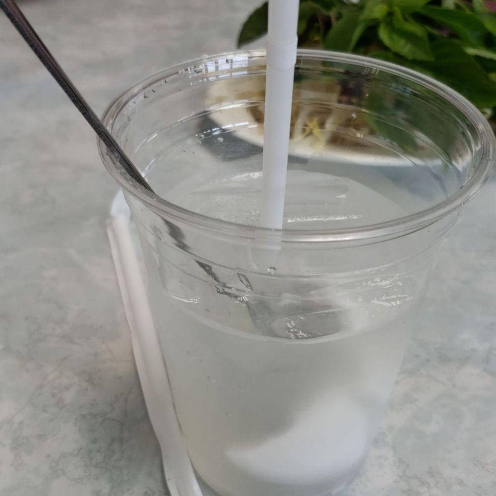 Pho 90 - Can someone explain to me what this is?? This is my second time ordering a coconut juice that is only HALF way filled! Greedy! - Vietnamese Near Me - Fresno, California