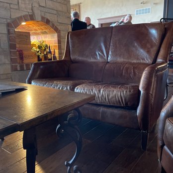 Weingarten Vineyard - a man sitting on a couch - Venues & Event Spaces Near Me - Ste. Genevieve, Missouri