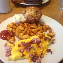 Perkins American Food - Smoked bacon and ham omelet with home fries and a mammoth banana nut muffin.