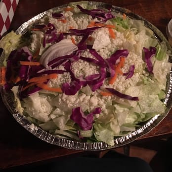 Mesa Pizza - All iceberg lettuce and shredded cheese. Not a single tomato, cucumber, green leaf to be found anywhere. Why was this $9? - Pizza Near Me - Santa Barbara, California