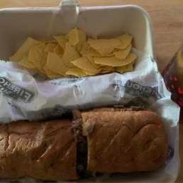 a sandwich and chips a sandwich and chips