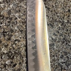 The Knife Stalkers - Newly very sharp kitchen knife (scratches are from my 25 years of use and not by the service performed)