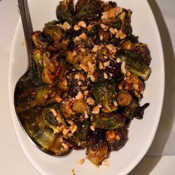 Eddie V's Prime Seafood - Honey Sriracha Roasted Brussels Sprouts with Cashews - Seafood Near Me - Fort Worth, Texas Eddie V's Prime Seafood - Honey Sriracha Roasted Brussels Sprouts with Cashews - Seafood Near Me - Fort Worth, Texas