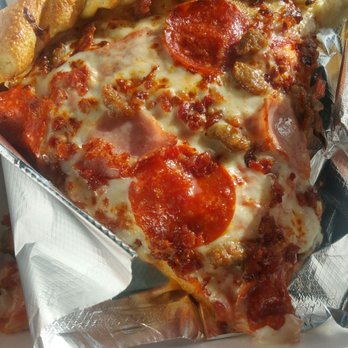Pilot Travel Center - Pizza is 2 for $5. Looks good,  smells good, taste good! - Gas Stations Near Me - Schulenburg, Texas