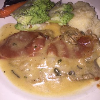 Assaggio Ristorante - Vitello Saltimbocca... Sautéed thin cut veal... The lighting doesn't do this entrée justice - Italian Near Me - Seattle, Washington