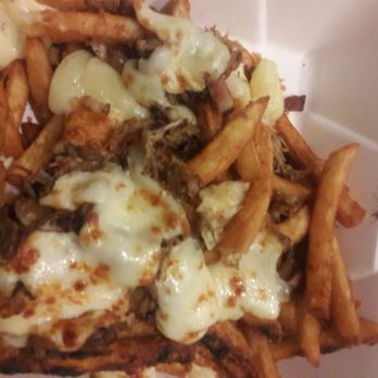 Barrel + Rye - The duck poutine, I had asked for gravy on the side so it wouldnt be a complete soggy mess when I got home! - Cocktail Bars Near Me - Geneva, Illinois