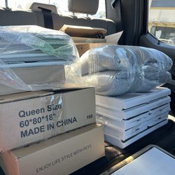 Amazon Hot Deals - My purchases on 12 dollar day included a fluffy mattress pad, fabric boxes, stackable plastic bins, a dog bed, under sink shelving