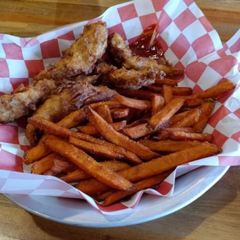 Fuddruckers - Chicken strips, sweet potato fries and bbq sauce - Burgers Near Me - Virginia Beach, Virginia Fuddruckers - Chicken strips, sweet potato fries and bbq sauce - Burgers Near Me - Virginia Beach, Virginia