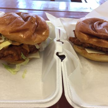 Cheeks Chicken & Waffles - Deluxe chicken sandwich on the left. Spicy chicken sandwich on the right. - Chicken Wings Near Me - Manchester, Connecticut